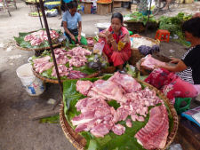 Butcher at market in Mandalay in Myanmar