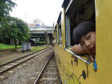 Curios boy on the train in Yangon
