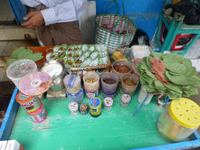 Street vendor making betel quid in Yangon