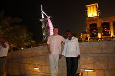 Gard and Nikki and Burj Al Arab at night, seen from Madinat Jumeirah