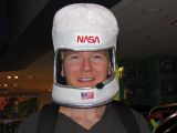 Testing out hats at Toys'R'us