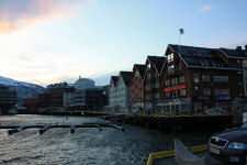Sea houses on the harbor in Troms