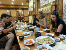 Group enjoying food on the night dining tour