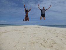 Gard and Nikki - jump on Virgin Island outside Bohol in the Philippines